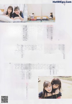 Two young women sitting on a white chair in a field.