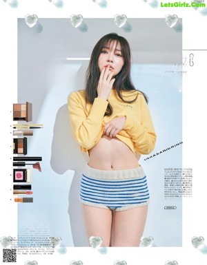 A magazine with a picture of a woman in a bikini.